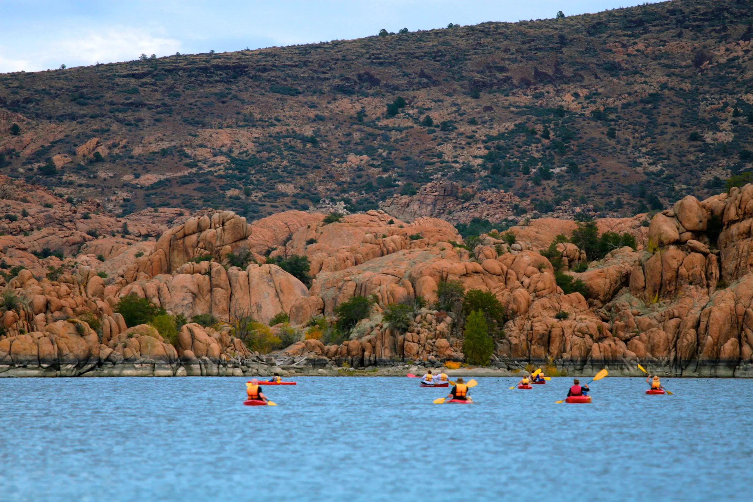 Several Kayakers on Watson Lake in Prescott Arizona